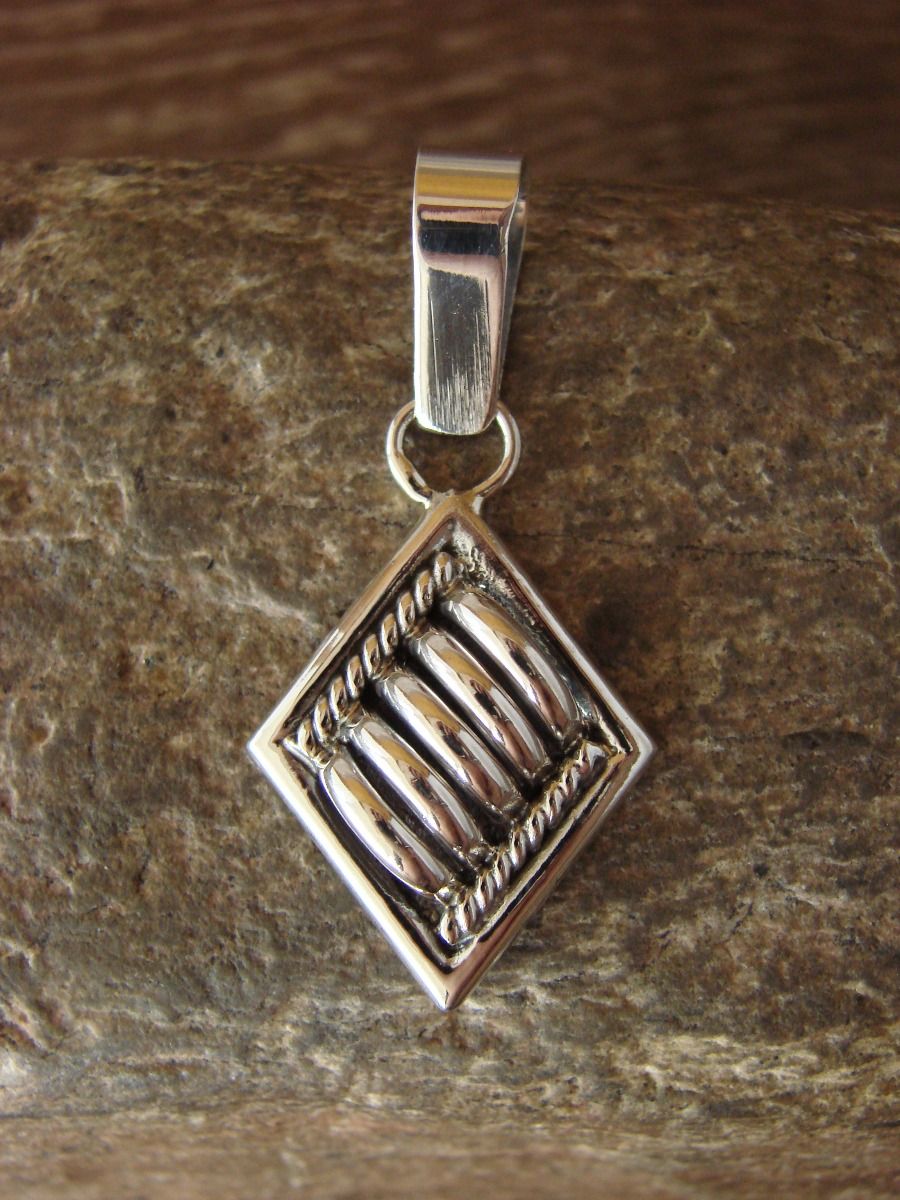 Native American Indian Jewelry Sterling Silver Ribbed Pendant by Thomas Charley 